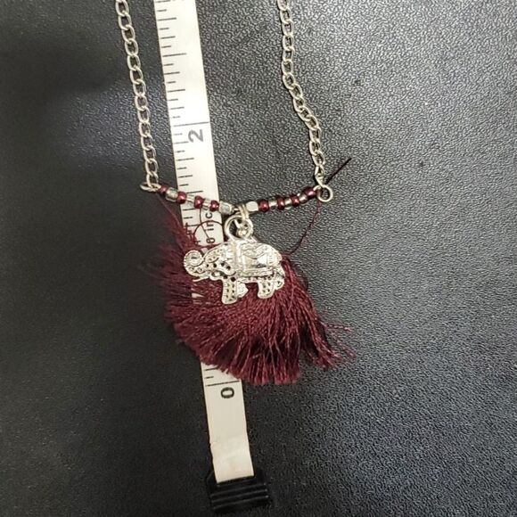Silver tone elephant and tassel necklace - Picture 5 of 10